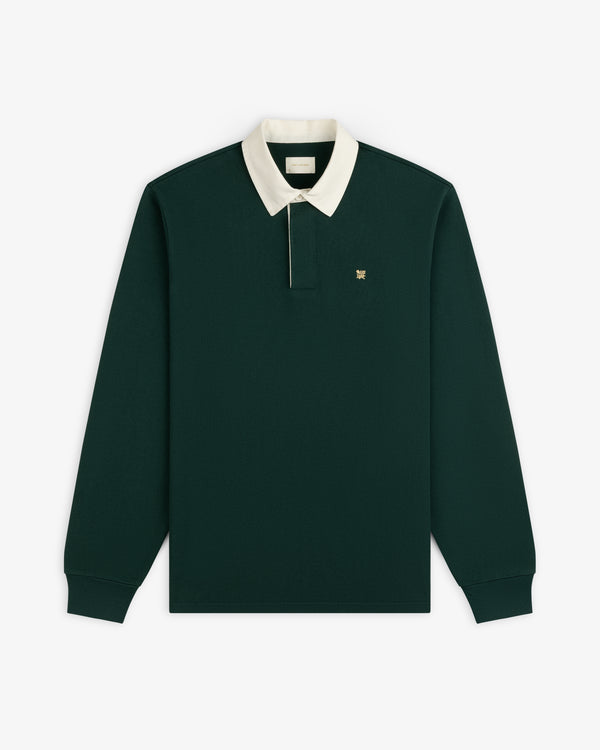 Crest Rugby: Dark green long-sleeve polo with white collar, embroidered chest logo, on white background.