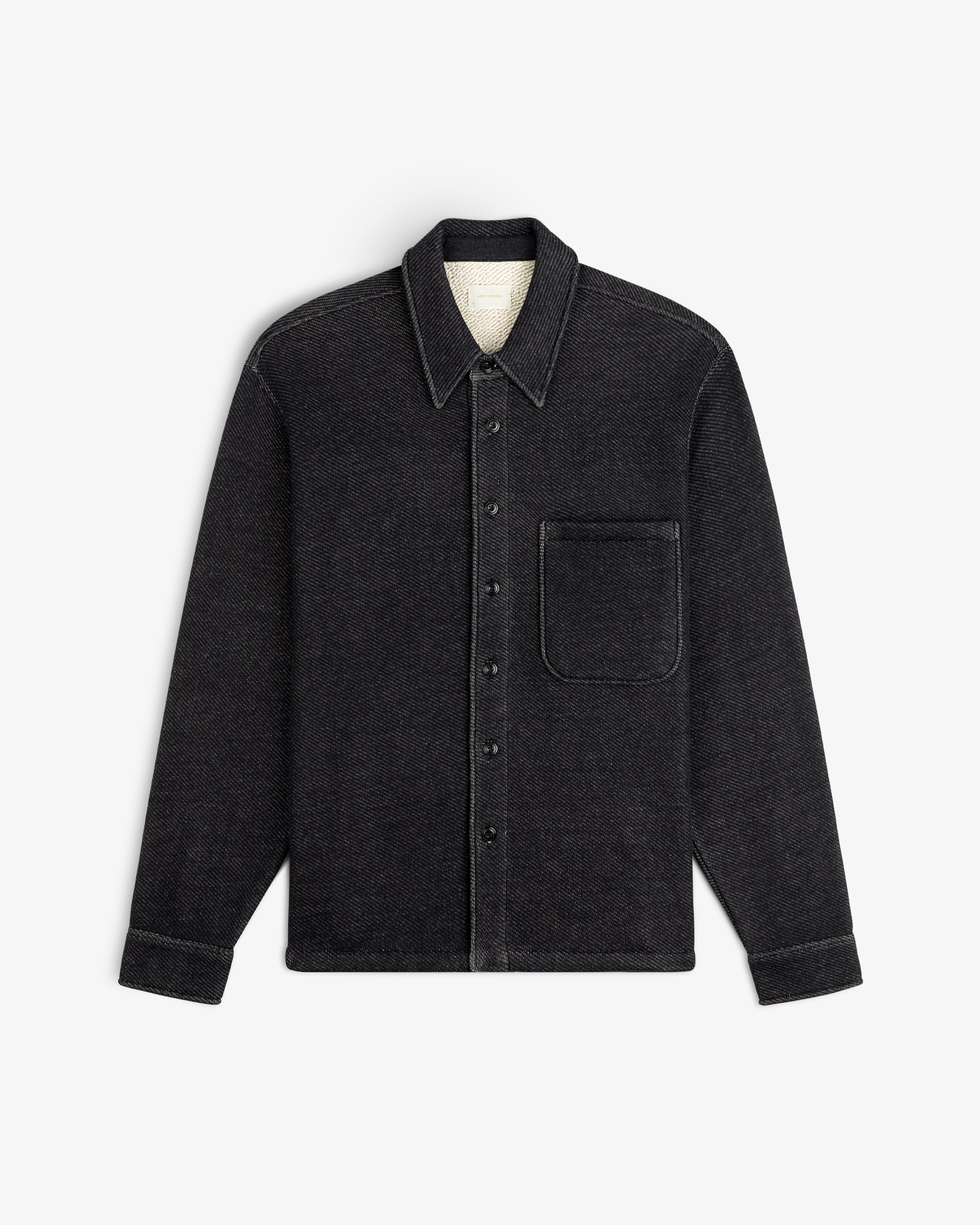 Terry Lounge Shirt: a black long-sleeve button-down with a collar, single chest pocket, and textured fabric.