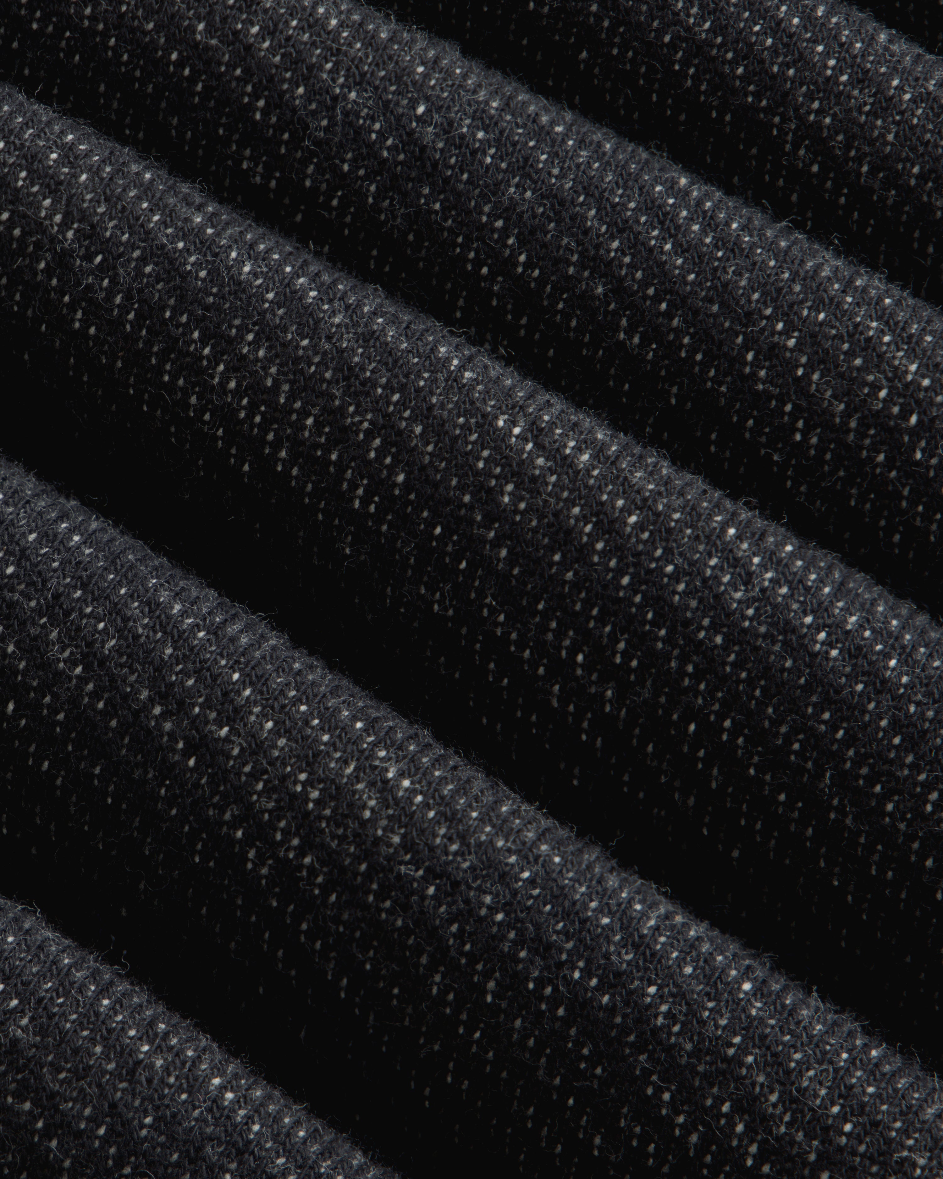 Close-up of the dark charcoal Terry Lounge Shirt, featuring folded fabric with a textured, flecked surface.