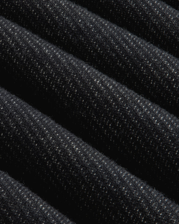 Close-up of the dark charcoal Terry Lounge Shirt, featuring folded fabric with a textured, flecked surface.