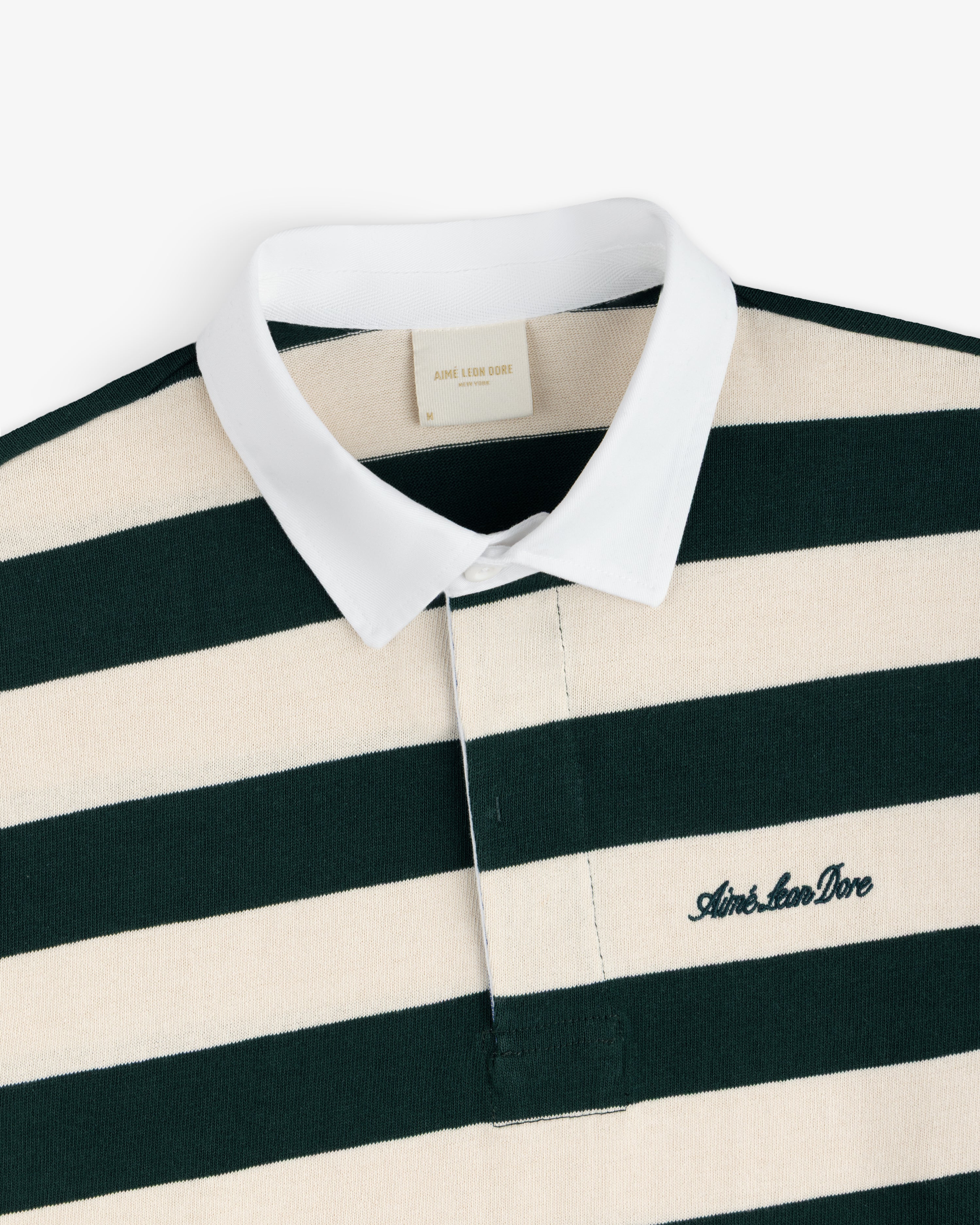 Striped Script Rugby shirt in green and cream with a white collar and an embroidered script logo.