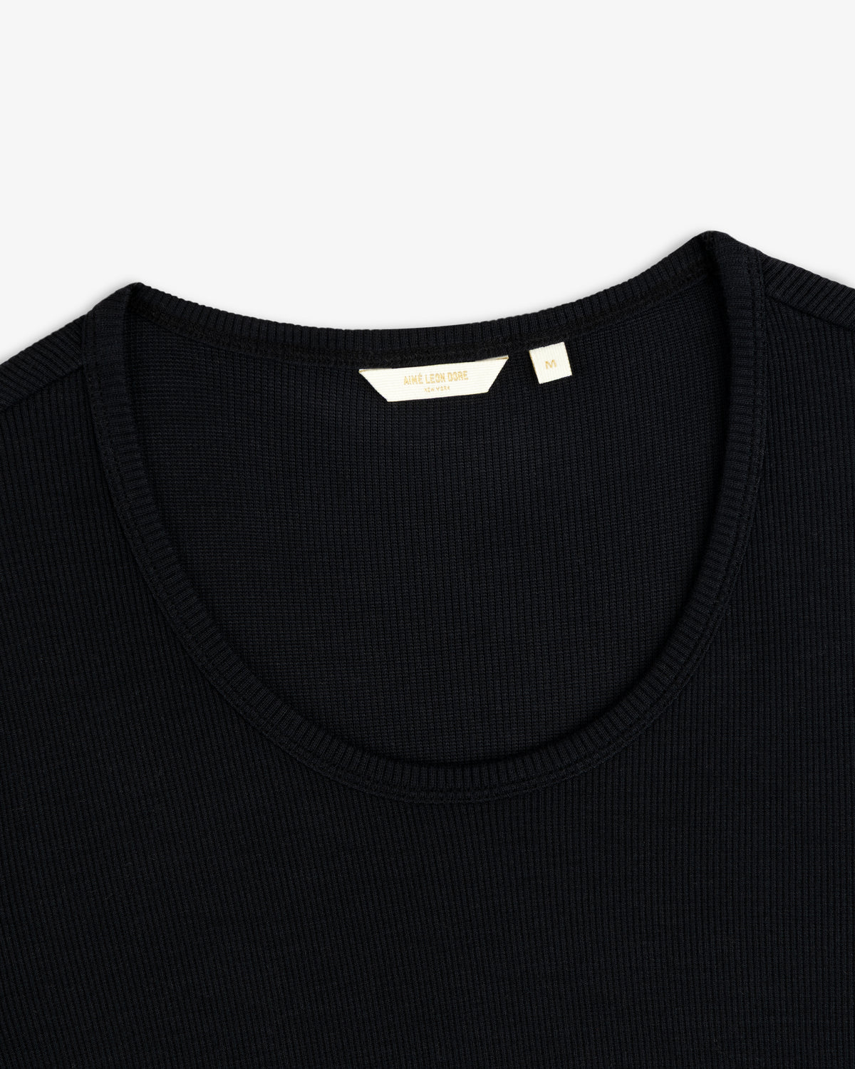 Ribbed Scoop Neck Long-Sleeve Tee in black with a scoop neck and long sleeves.