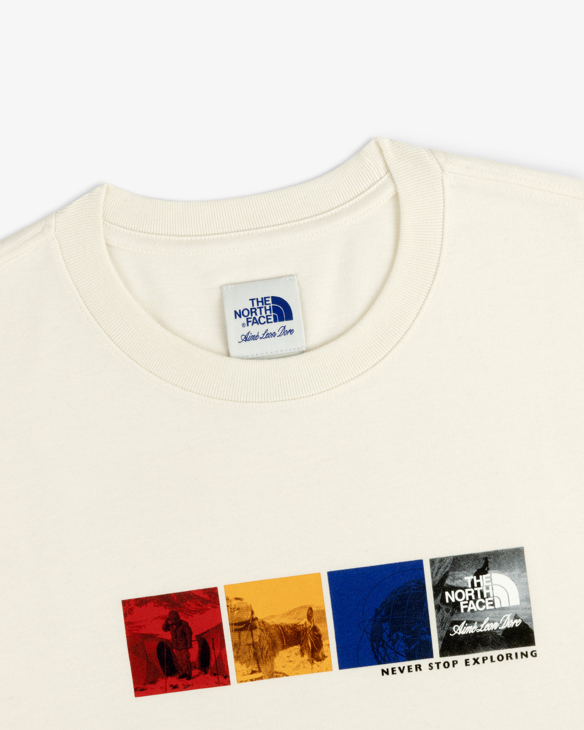ALD / The North Face Explorer Tee with 4 colorful outdoor scene squares and “Never Stop Exploring” text.