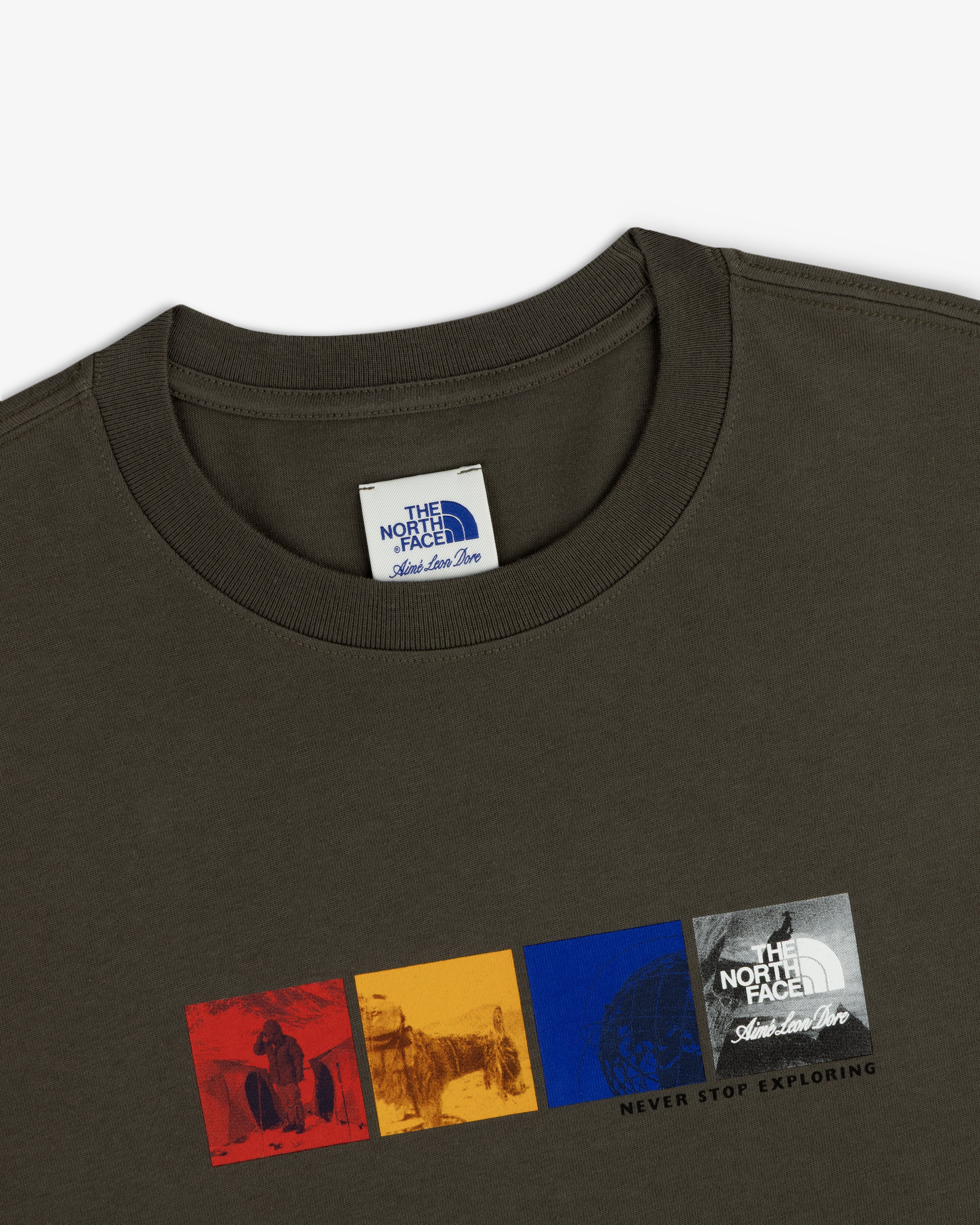 Dark green ALD/The North Face Long-Sleeve Explorer Tee with multicolor graphic and “Never Stop Exploring” slogan front.