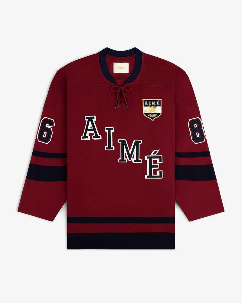 Maroon Team Aimé Hockey Jersey with AIME on the front, the number 8 on the sleeves, and a team crest on the chest.