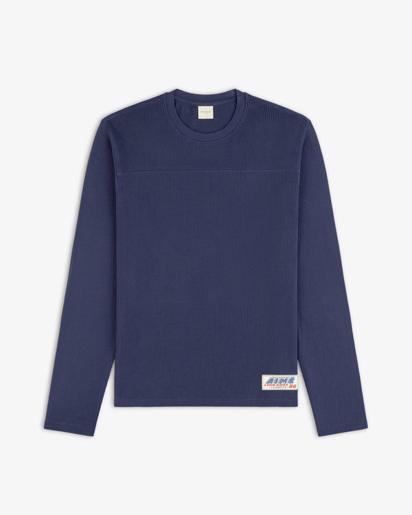 Navy blue Long-Sleeve Mesh Football Tee with ribbed texture and a small white label near the bottom hem.