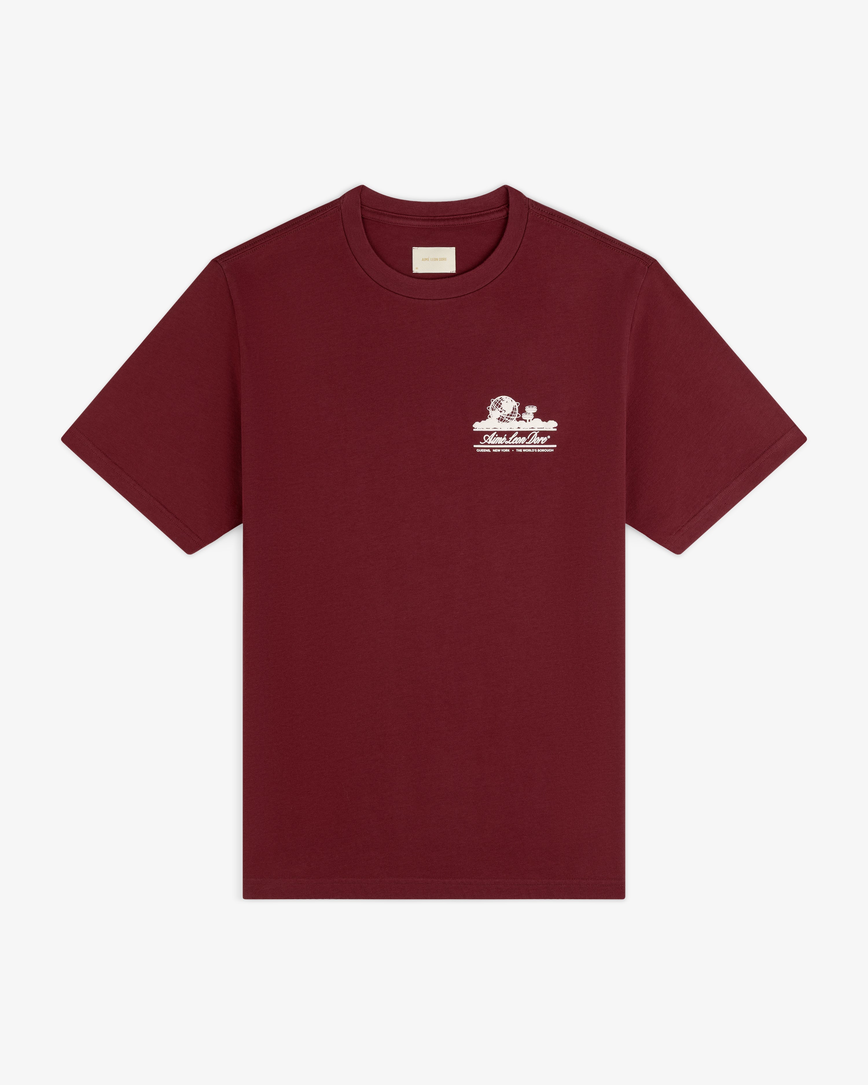 Unisphere Tee: A maroon t-shirt with a small white graphic and text on the left chest.
