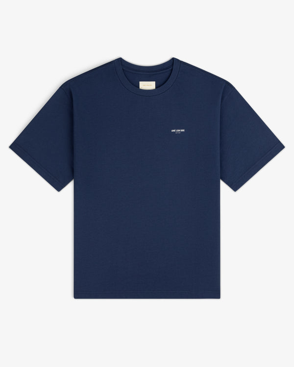 Micro Logo Tee in navy, short sleeves, small white chest text, displayed flat on a white background.