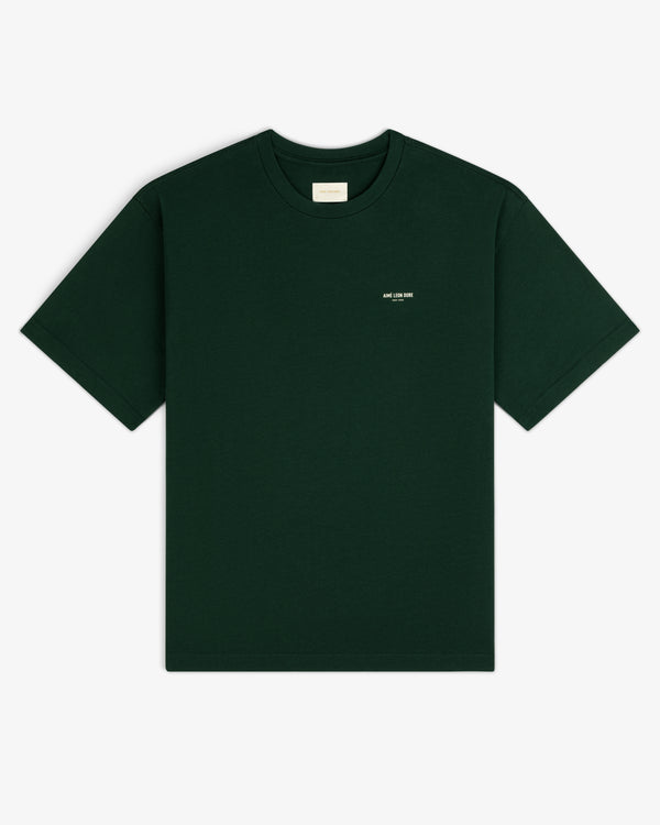 Dark green Micro Logo Tee with small white chest text, shown on a white background.