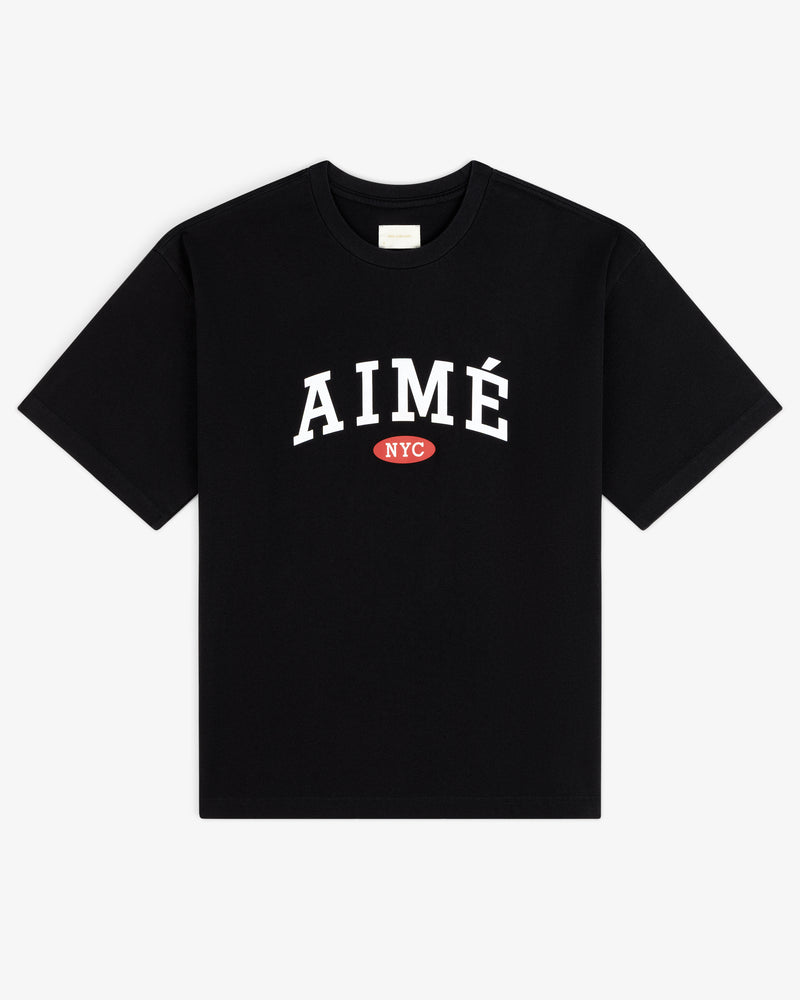 Aimé Souvenir Tee: Black shirt with bold white AIMÉ and small red NYC oval below the text.