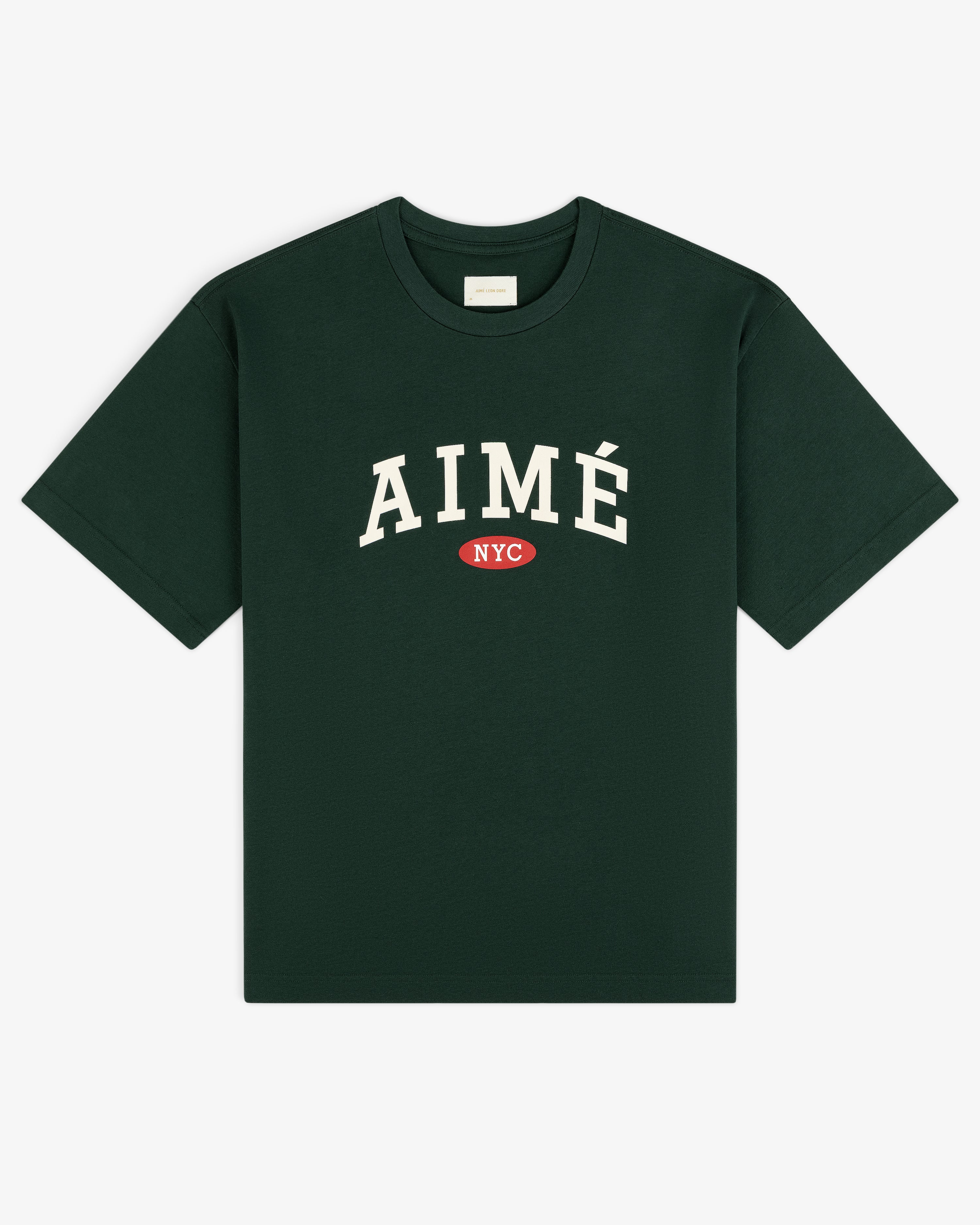 Aimé Souvenir Tee: Dark green with bold white AIMÉ lettering and a small red NYC oval underneath.
