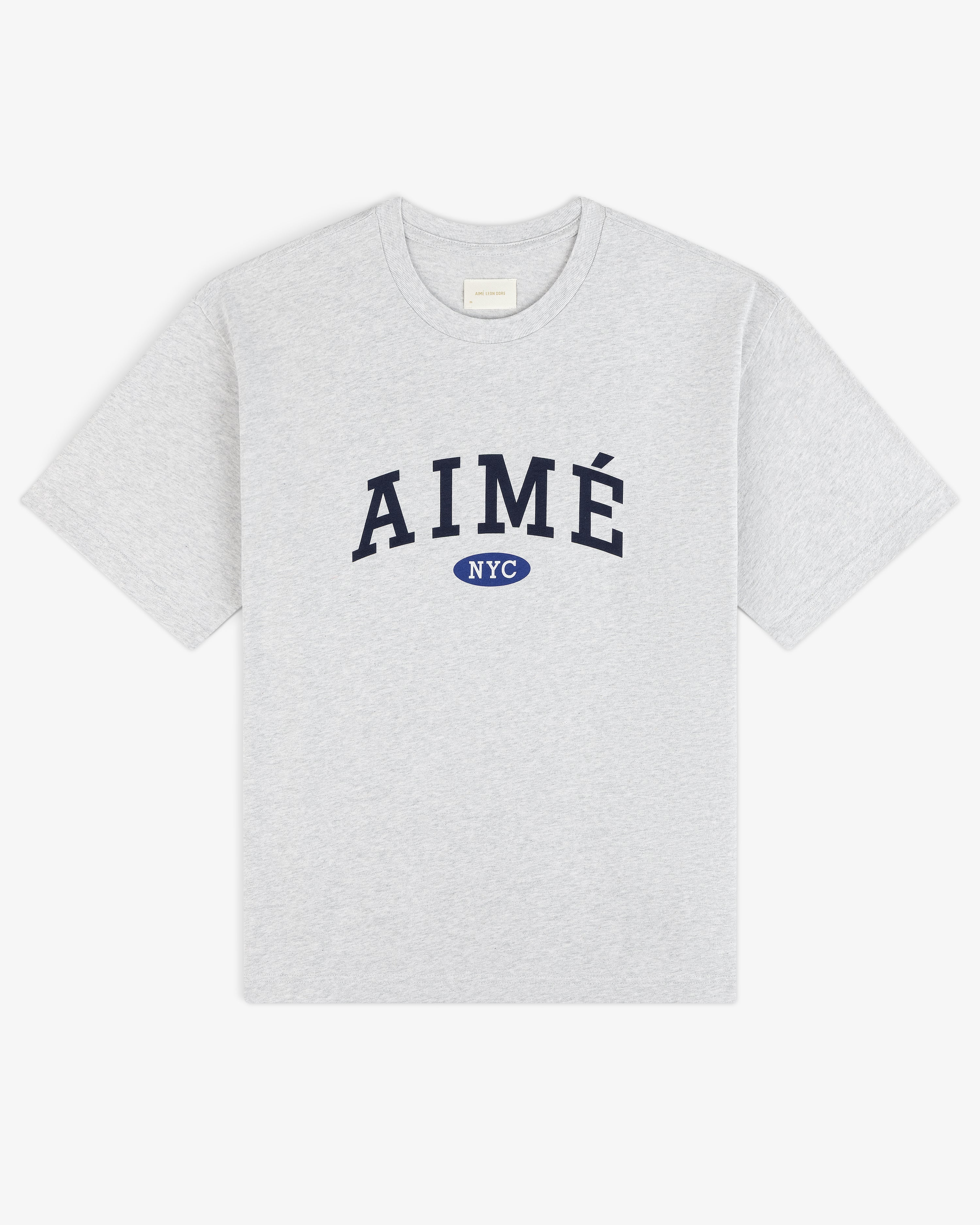 Aimé Souvenir Tee: Light gray tee with big navy AIMÉ text and a small blue NYC oval beneath.
