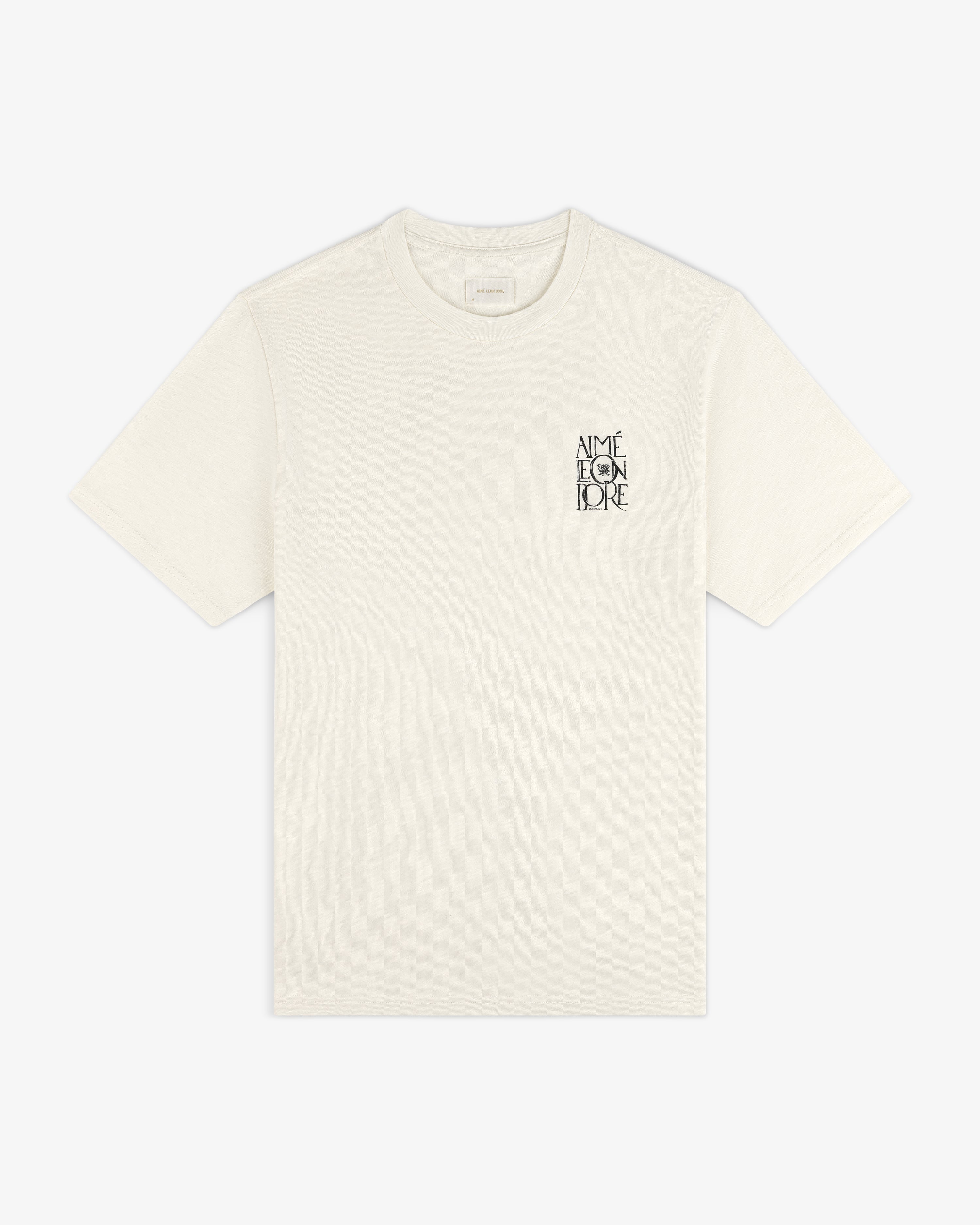 Off-white Stacked Logo Slub Tee with black AIMÉ LEON DORE text on the left chest.