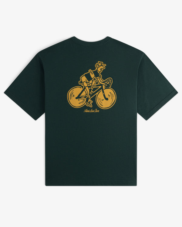 Aimé Tour Graphic Tee in dark green with a yellow bicycle rider graphic and text on the back.