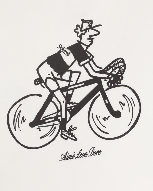 Black and white cartoon cyclist with “Aimé Leon Dore” text, featured on the Aimé Tour Graphic Tee.