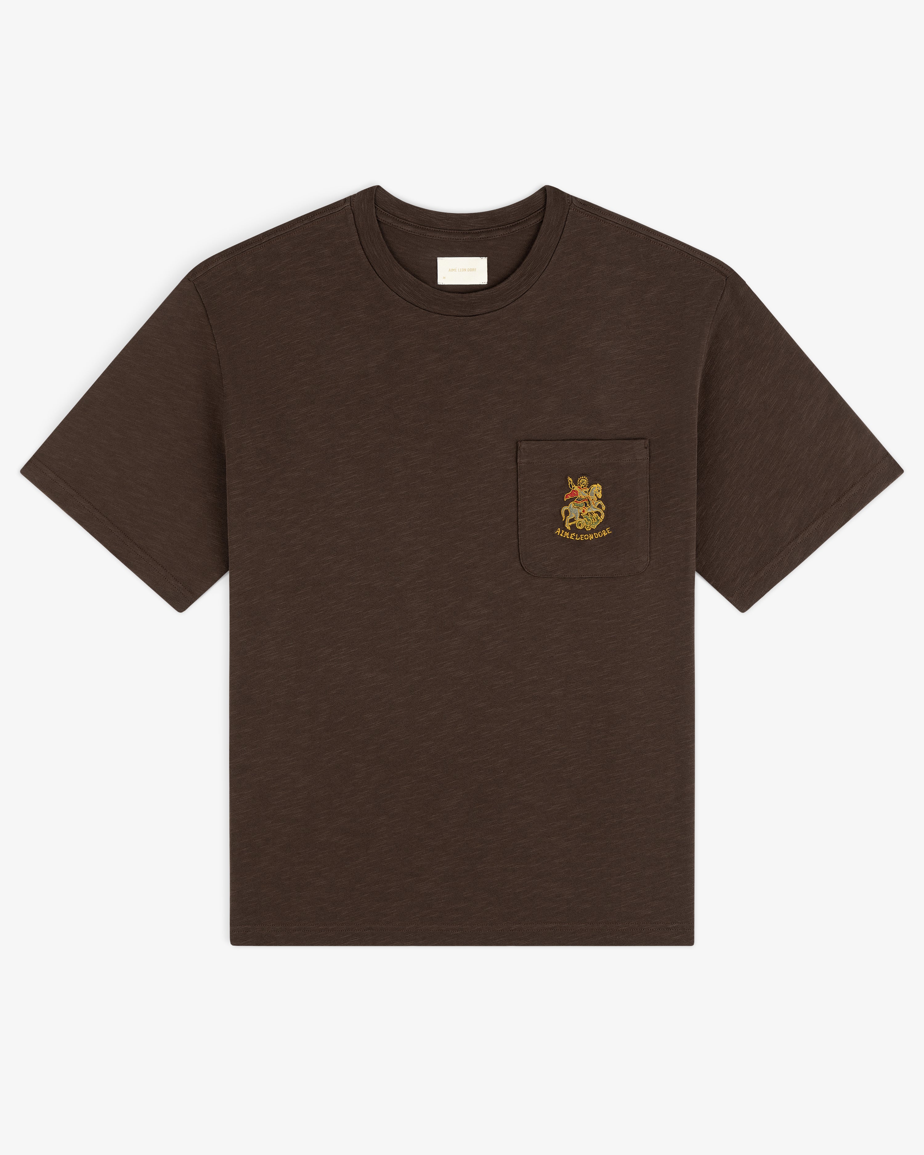 Saint George Slub Pocket Tee—brown, short sleeves, animal crest on chest pocket, shown on white background.