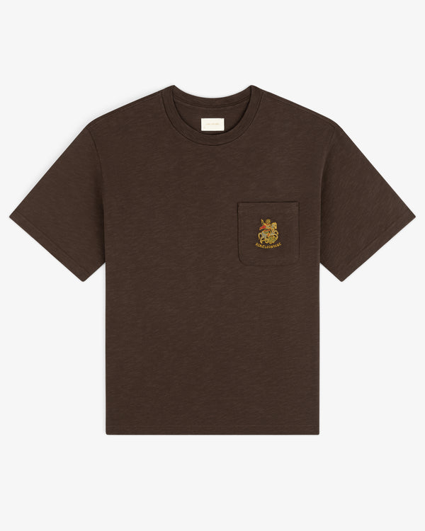 Saint George Slub Pocket Tee—brown, short sleeves, animal crest on chest pocket, shown on white background.