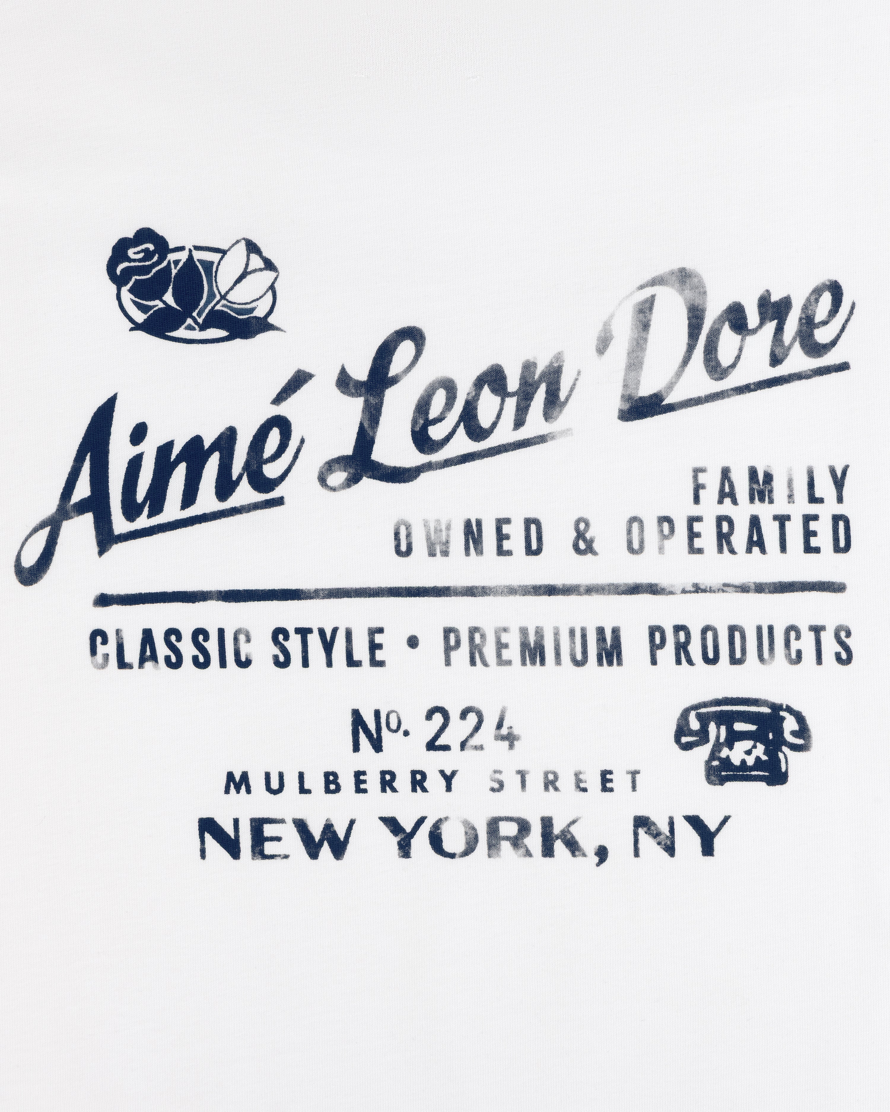 Neighborhood Tee featuring Aimé Leon Dore logo, roses, address, and vintage phone graphic in blue text.