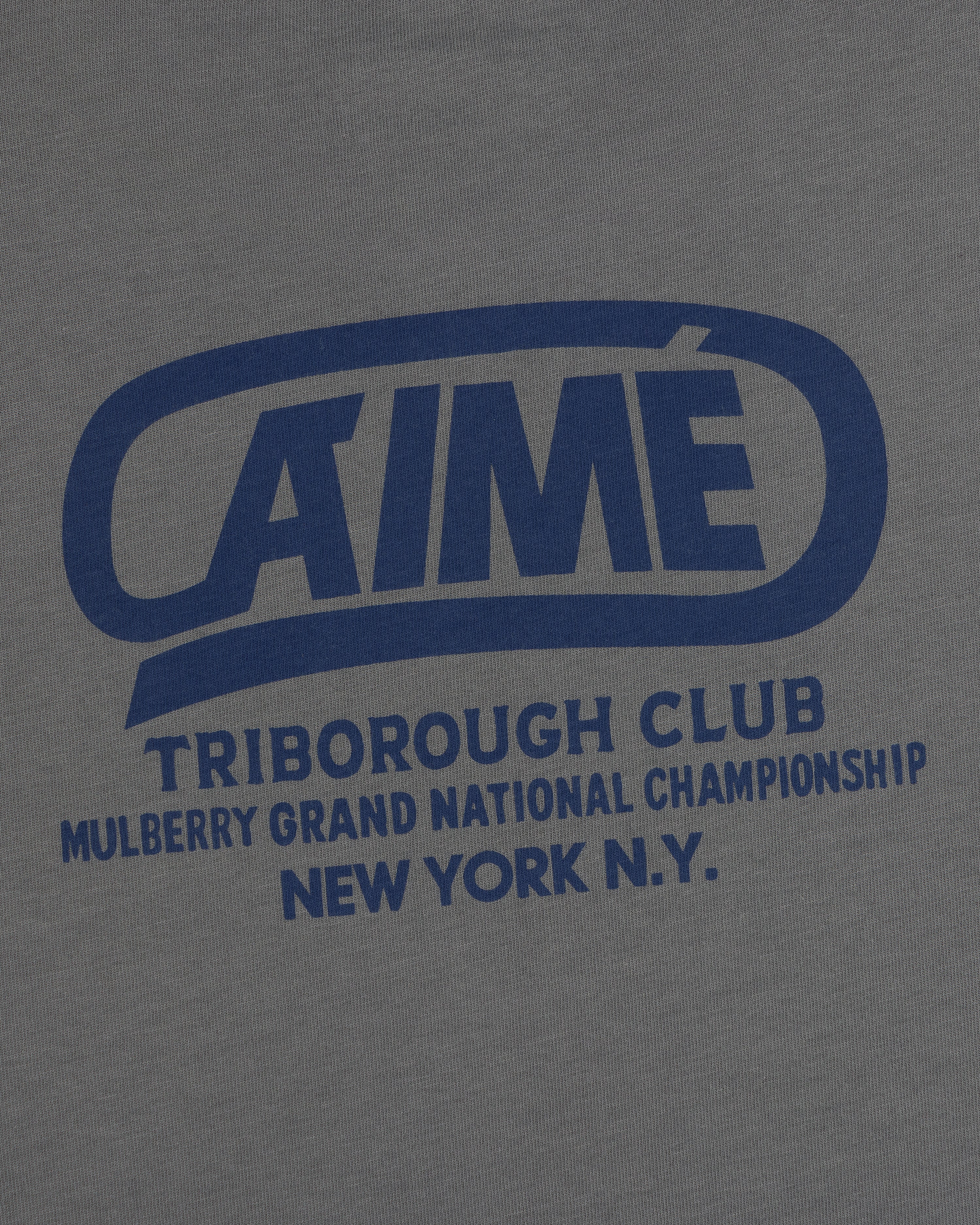 Grey Triborough Club Tee with a blue graphic reading AIMÉ TRIBOROUGH CLUB MULBERRY GRAND NATIONAL CHAMPIONSHIP NEW YORK N.Y.