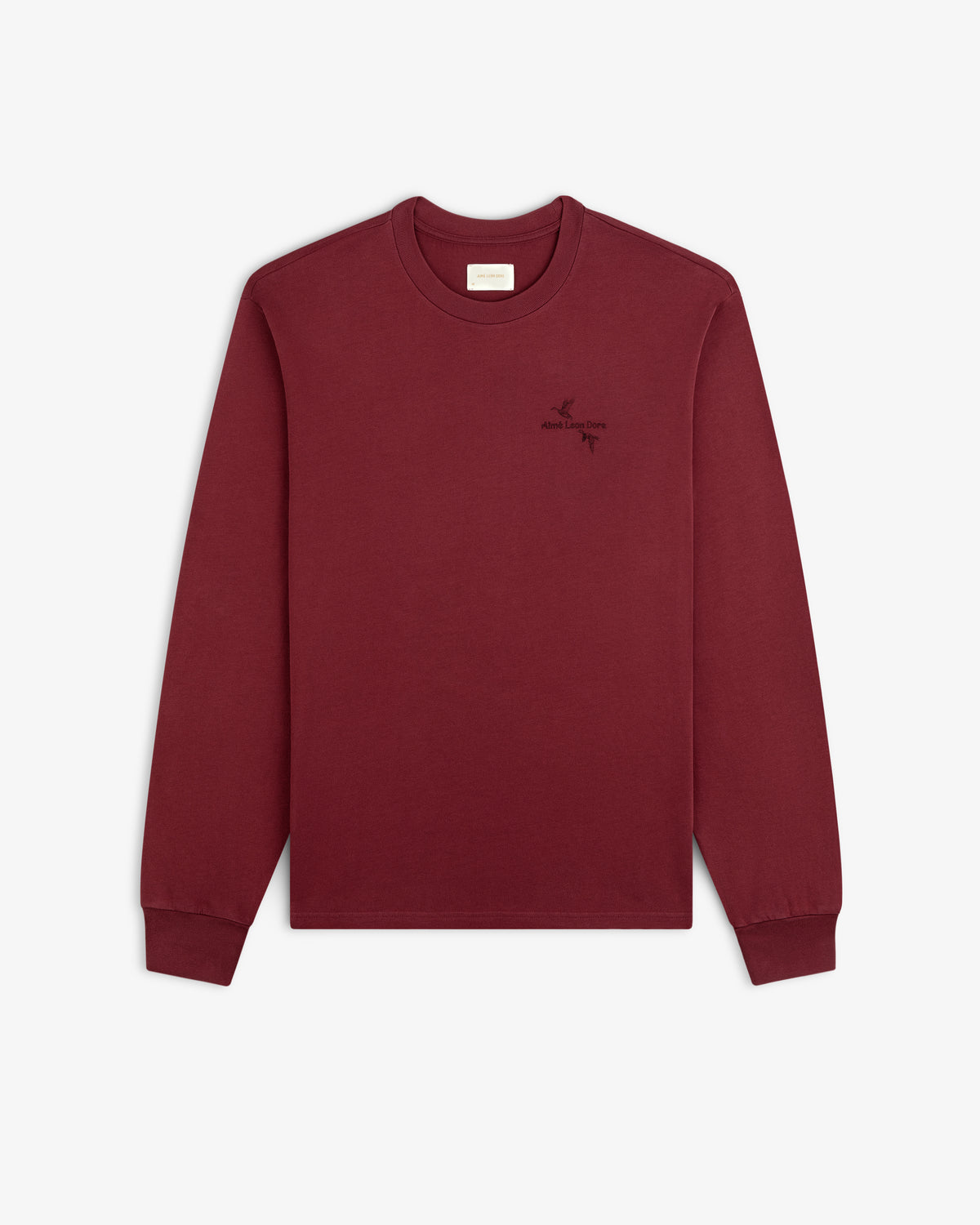 Maroon long-sleeve Long-Sleeve Retriever Tee with a small embroidered bird design and text on the chest.