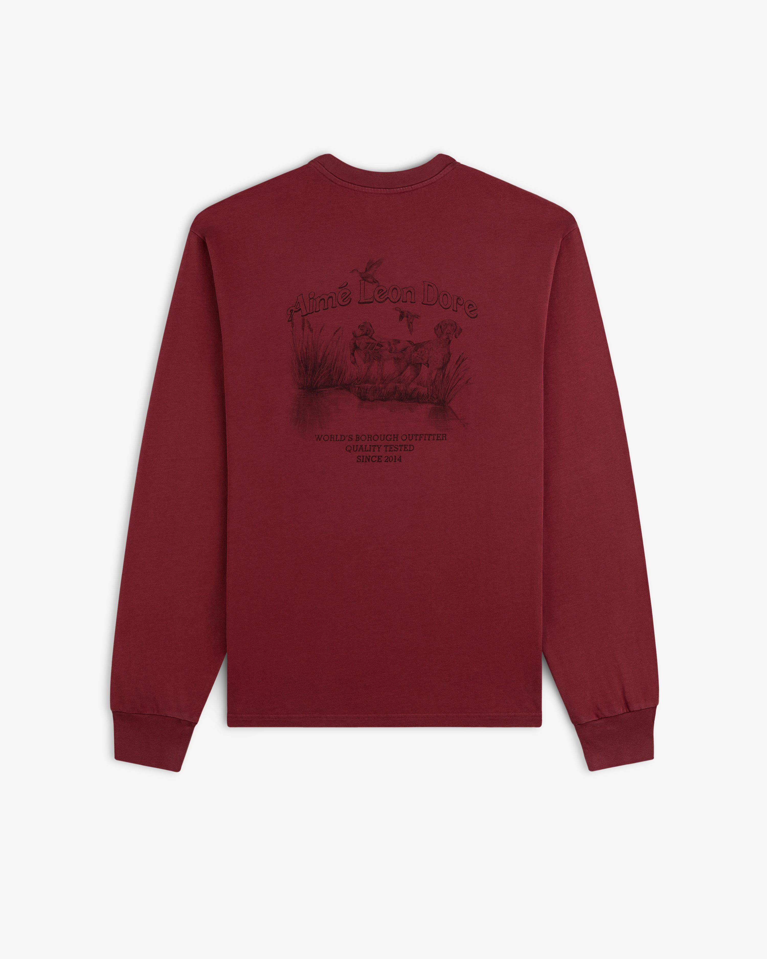 Long-Sleeve Retriever Tee in maroon with a graphic of two dogs in a marsh on the back.