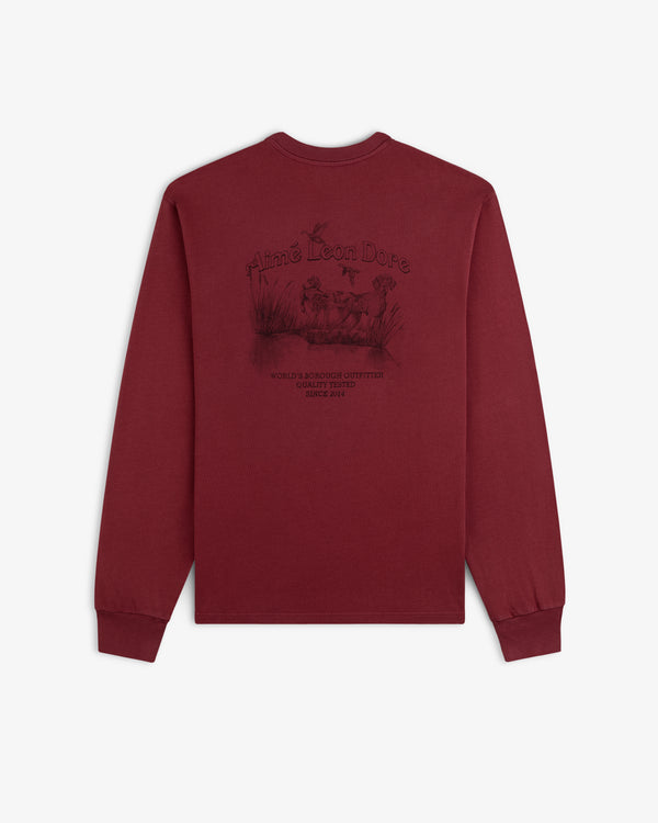 Long-Sleeve Retriever Tee in maroon with a graphic of two dogs in a marsh on the back.