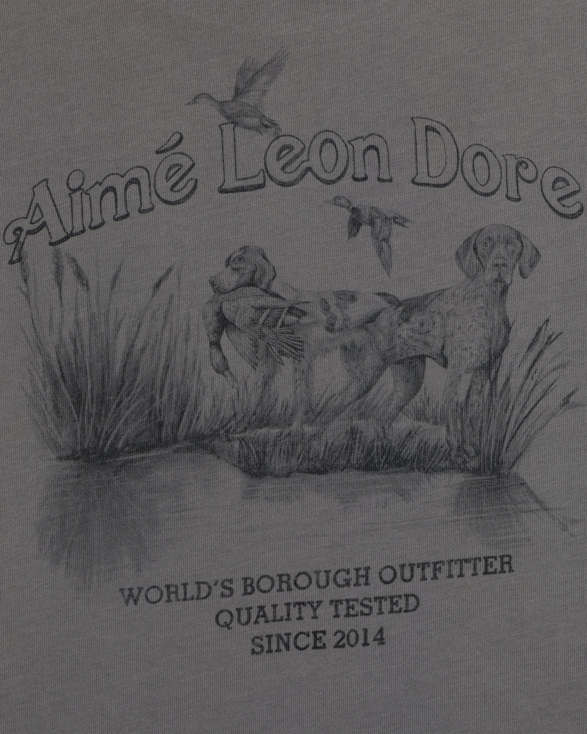 Graphite illustration of a hunting dog in a marsh with birds on a Long-Sleeve Retriever Tee with printed text.