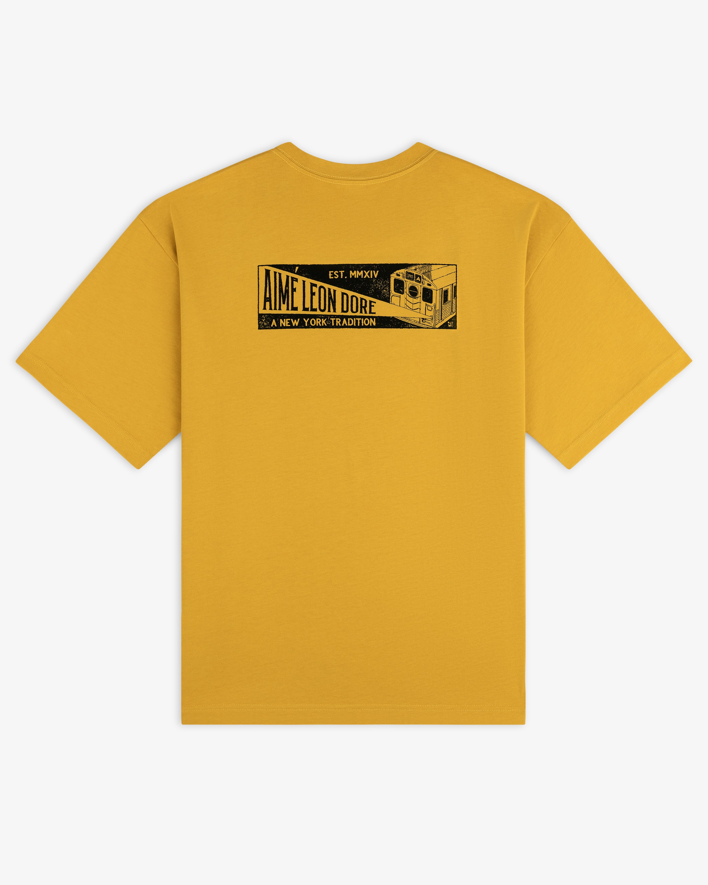 Mustard yellow short-sleeve Aimé Transit Tee with a graphic on the back of a subway car and text reading Aime Leon Dore.