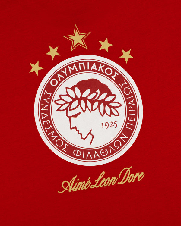 Red ALD / Olympiacos F.C. Souvenir Tee featuring a white and gold emblem with five gold stars.