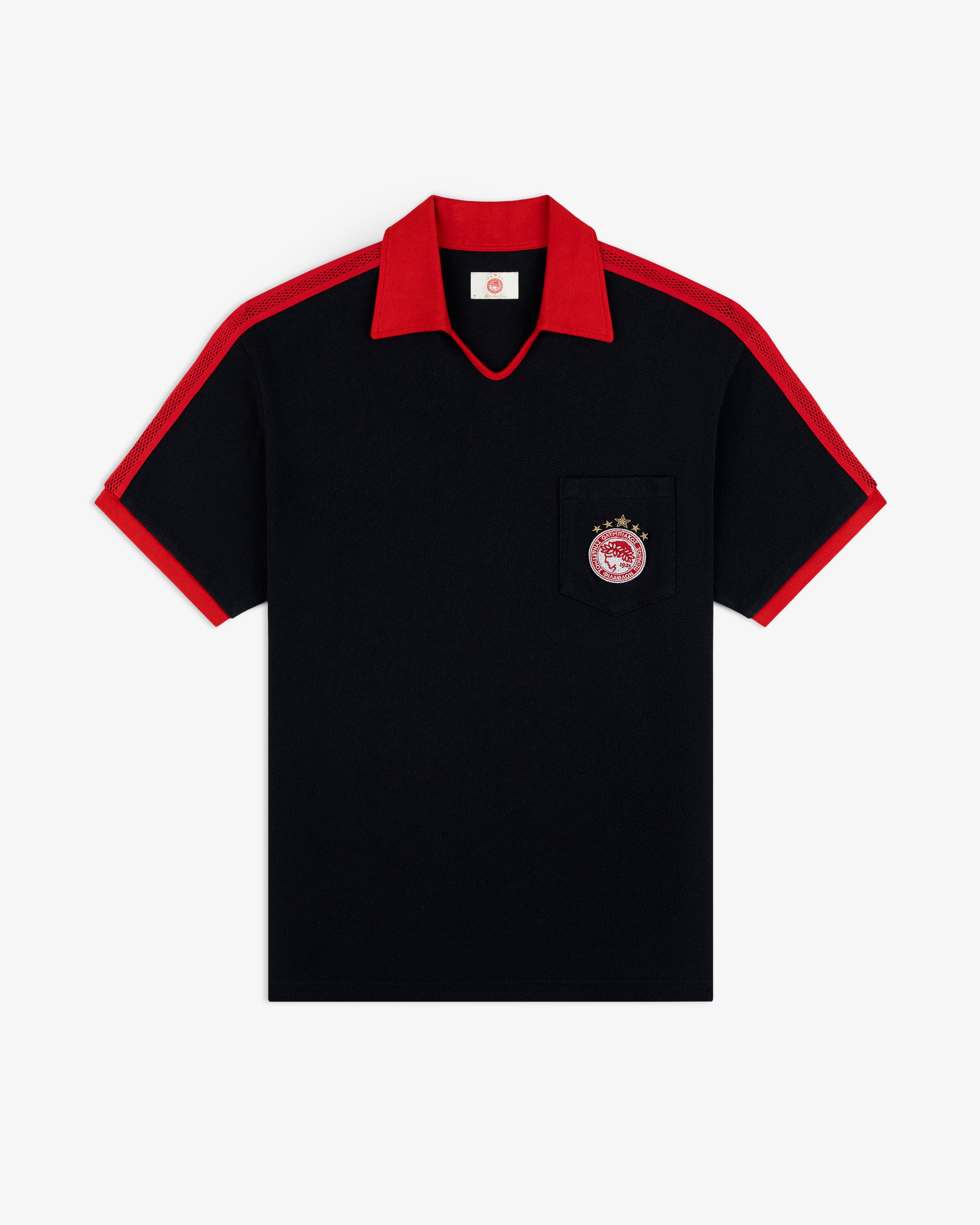 ALD / Olympiacos F.C. Heritage Ringer Polo: black short-sleeved shirt with red collar, cuffs, mesh panels, and chest logo.