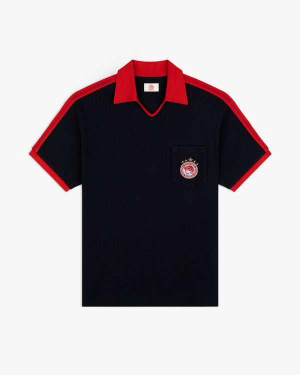 ALD / Olympiacos F.C. Heritage Ringer Polo: black short-sleeved shirt with red collar, cuffs, mesh panels, and chest logo.