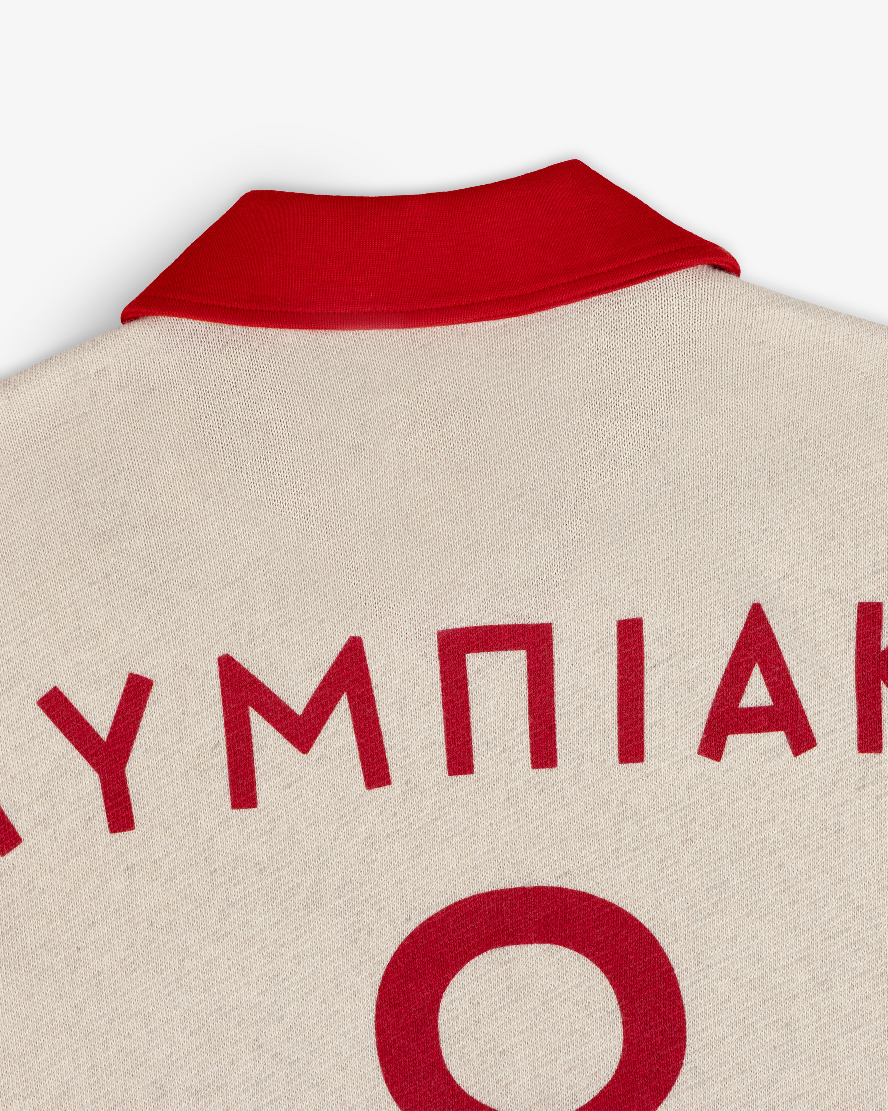 ALD / Olympiacos F.C. Heritage Ringer Polo: off-white shirt, red collar, red Greek lettering, and a large back number.