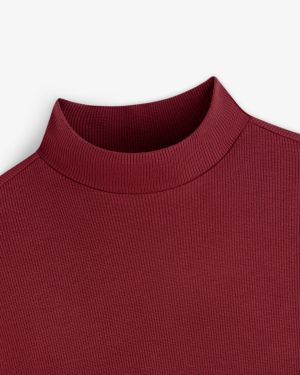 Close-up of a deep red Ribbed Mockneck Long-Sleeve Tee with a ribbed texture and mock neckline.