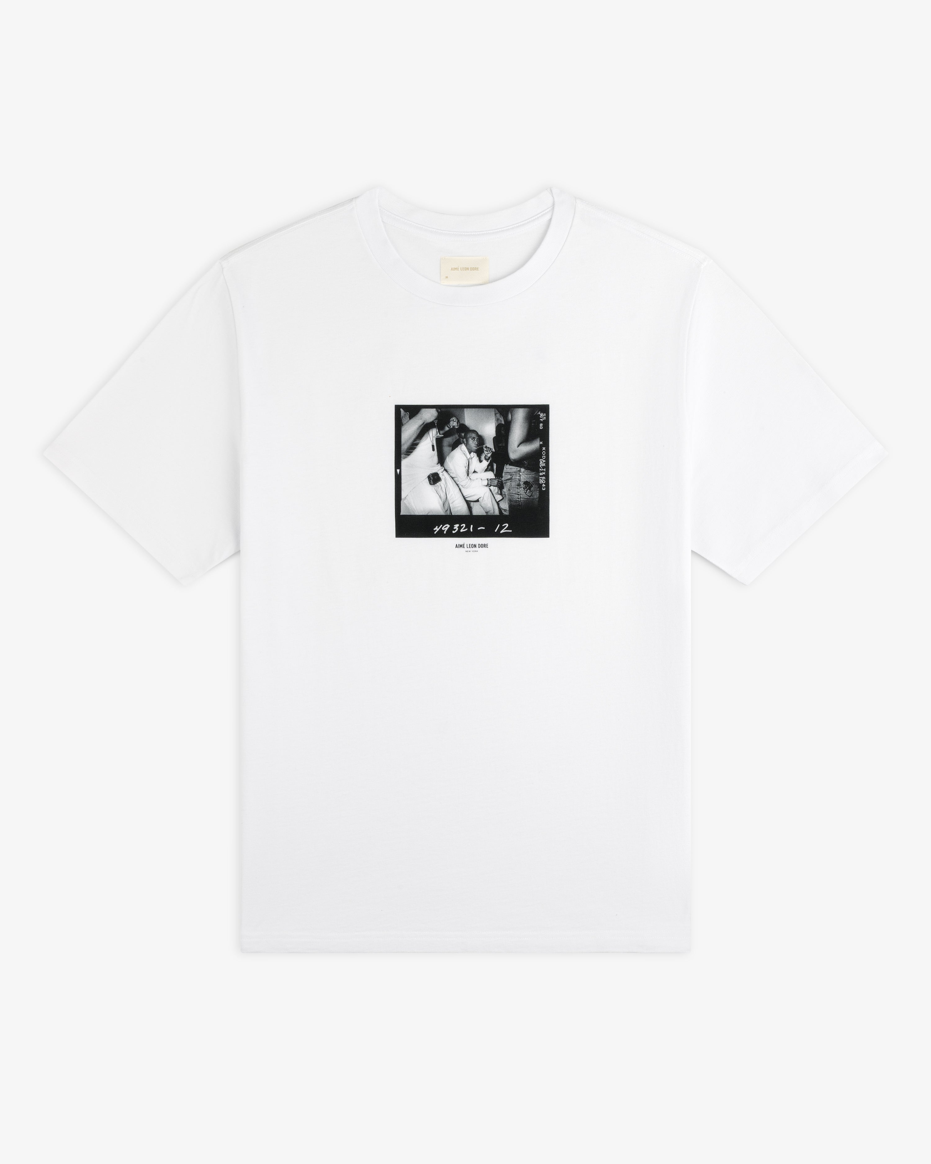 The Esco Tee is a white short-sleeve t-shirt with a square black and white photographic print on the chest.