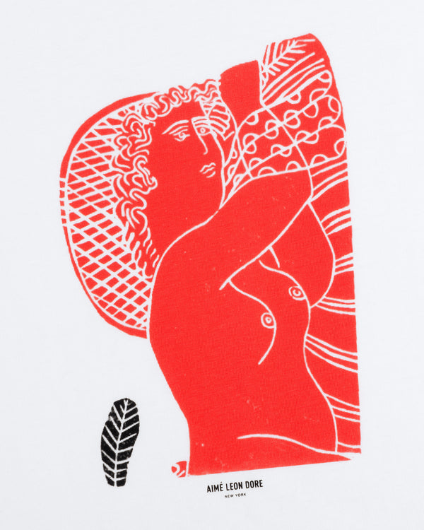 Fassianos Red Lady Tee: white t-shirt with a red illustration of a reclining woman and a small black leaf icon.