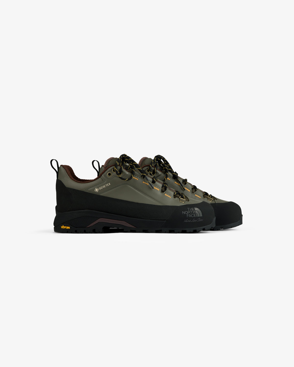 ALD/The North Face Verto Alpine GORE-TEX hiking shoes in olive green with black soles and yellow lace accents.