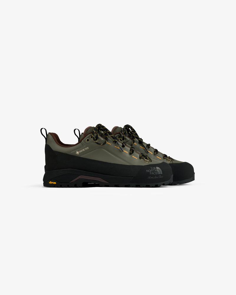ALD/The North Face Verto Alpine GORE-TEX hiking shoes in olive green with black soles and yellow lace accents.