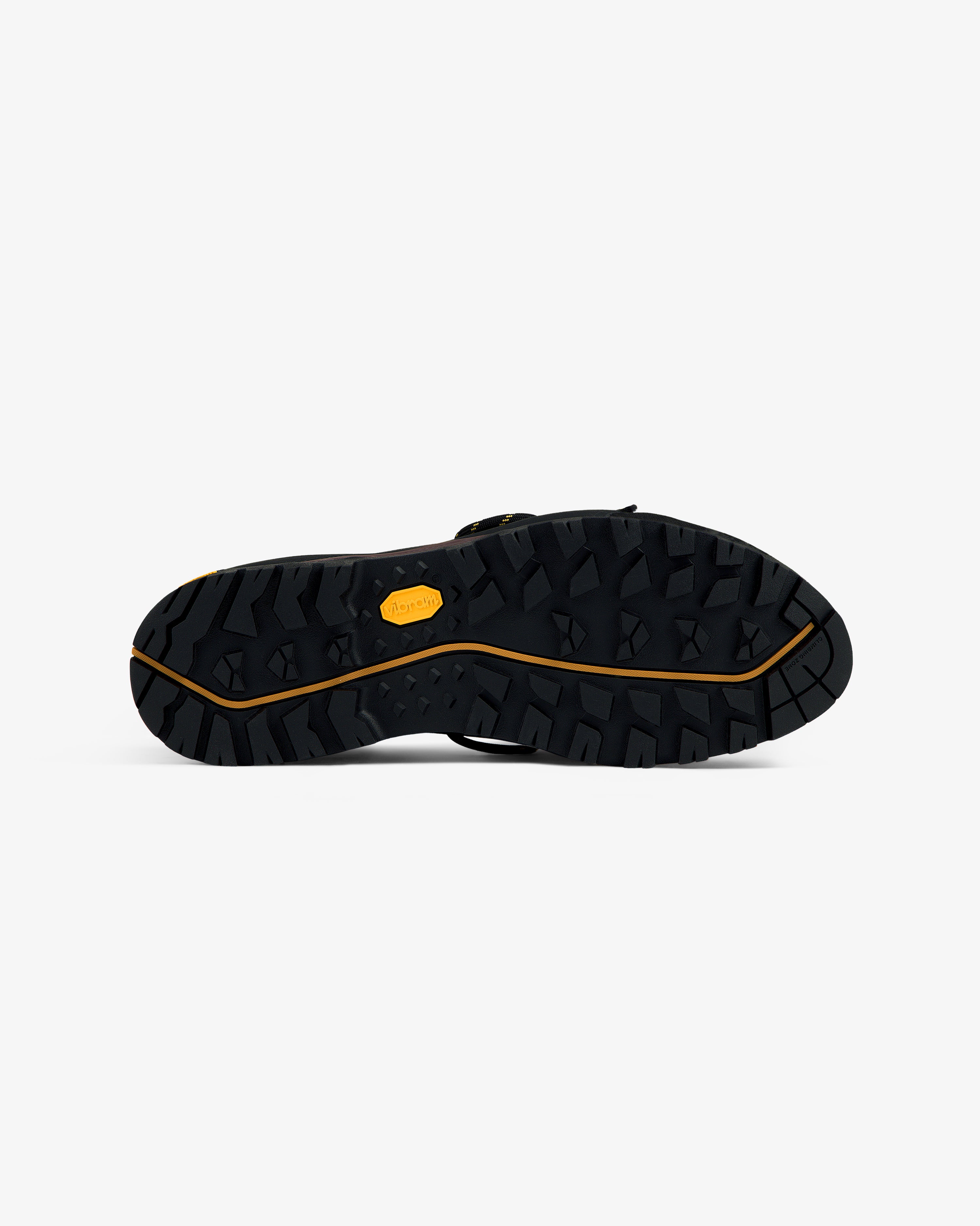 ALD/The North Face Verto Alpine GORE-TEX shoe sole, rugged black tread, viewed from the bottom on white background.
