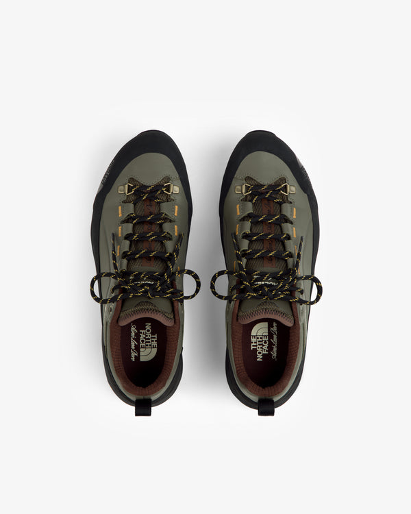 ALD/The North Face Verto Alpine GORE-TEX hiking shoes in green/black with yellow laces, top view on white background.