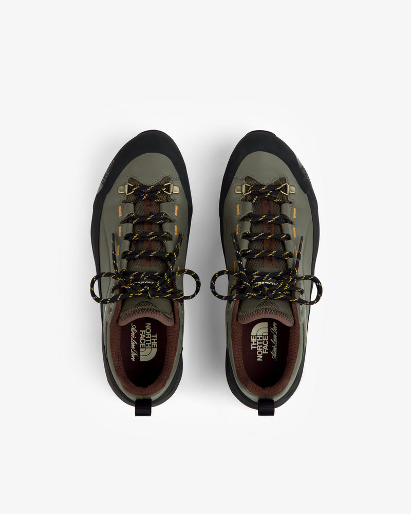 ALD/The North Face Verto Alpine GORE-TEX hiking shoes in green/black with yellow laces, top view on white background.