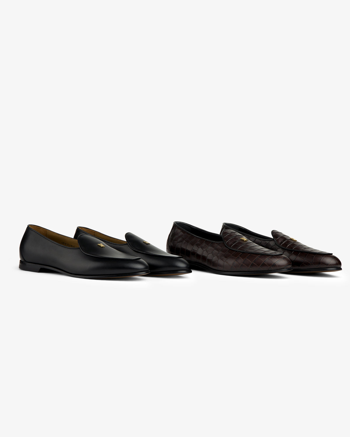 Two Croc-Embossed Crest Salóni Loafers, black leather and dark brown quilted, displayed on a white background.
