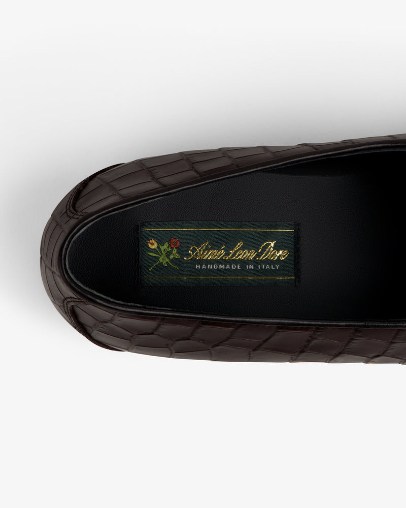 Brown croc-embossed leather Salóni Loafer with black insole labeled Sidone Lorusso Handmade in Italy and floral crest.