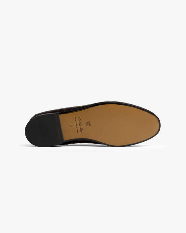 Tan Croc-Embossed Crest Salóni Loafer sole with black heel, shown bottom-up on a white background.