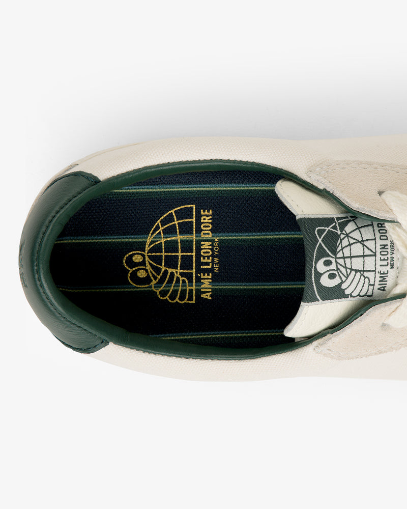 Top view of ALD / Last Resort AB VM001-LO Canvas, green lining, gold Aimé Leon Dore logo on black insole.