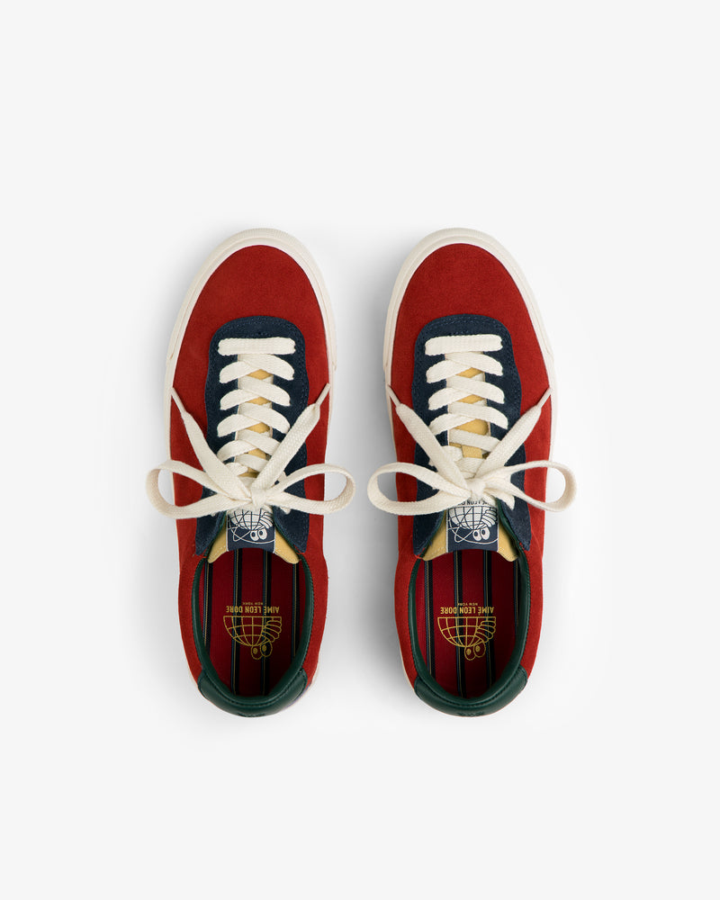 ALD / Last Resort AB VM001-LO Suede in red, navy & cream suede with white laces, seen from above on a white background.