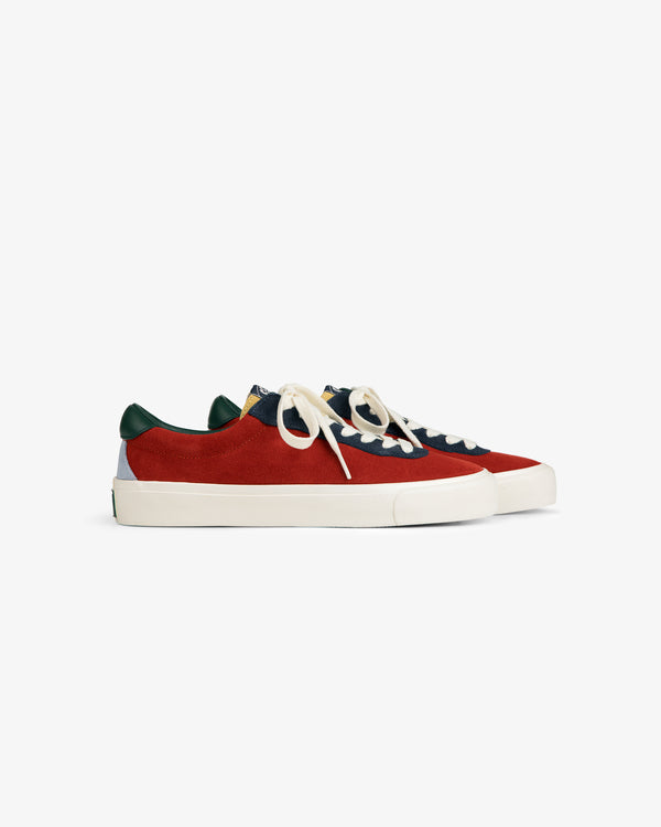 ALD / Last Resort AB VM001-LO Suede low-tops in red, navy, and green suede with white laces and soles, side view.