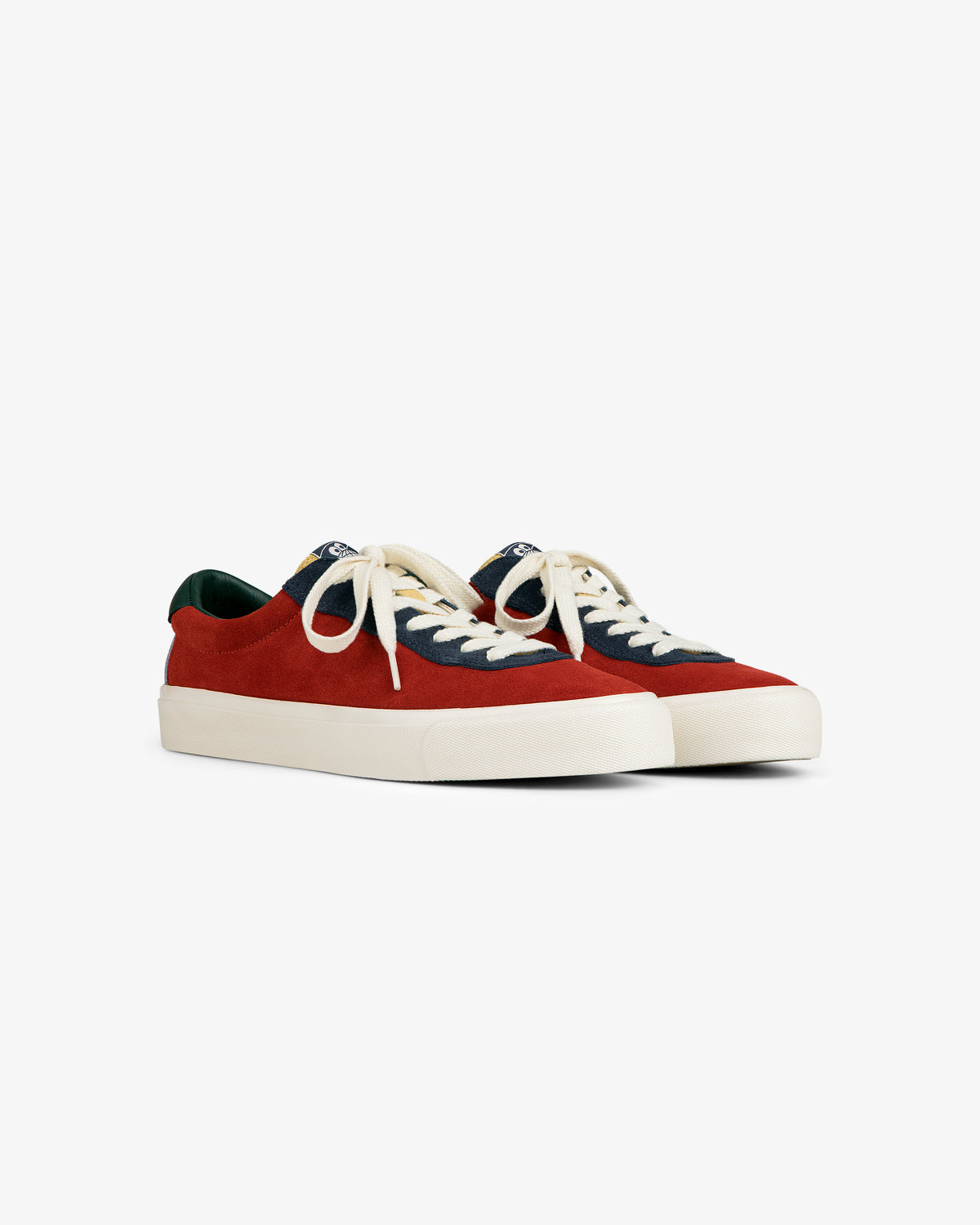 ALD / Last Resort AB VM001-LO Suede in red/navy with cream laces and white soles, shown on a white background.