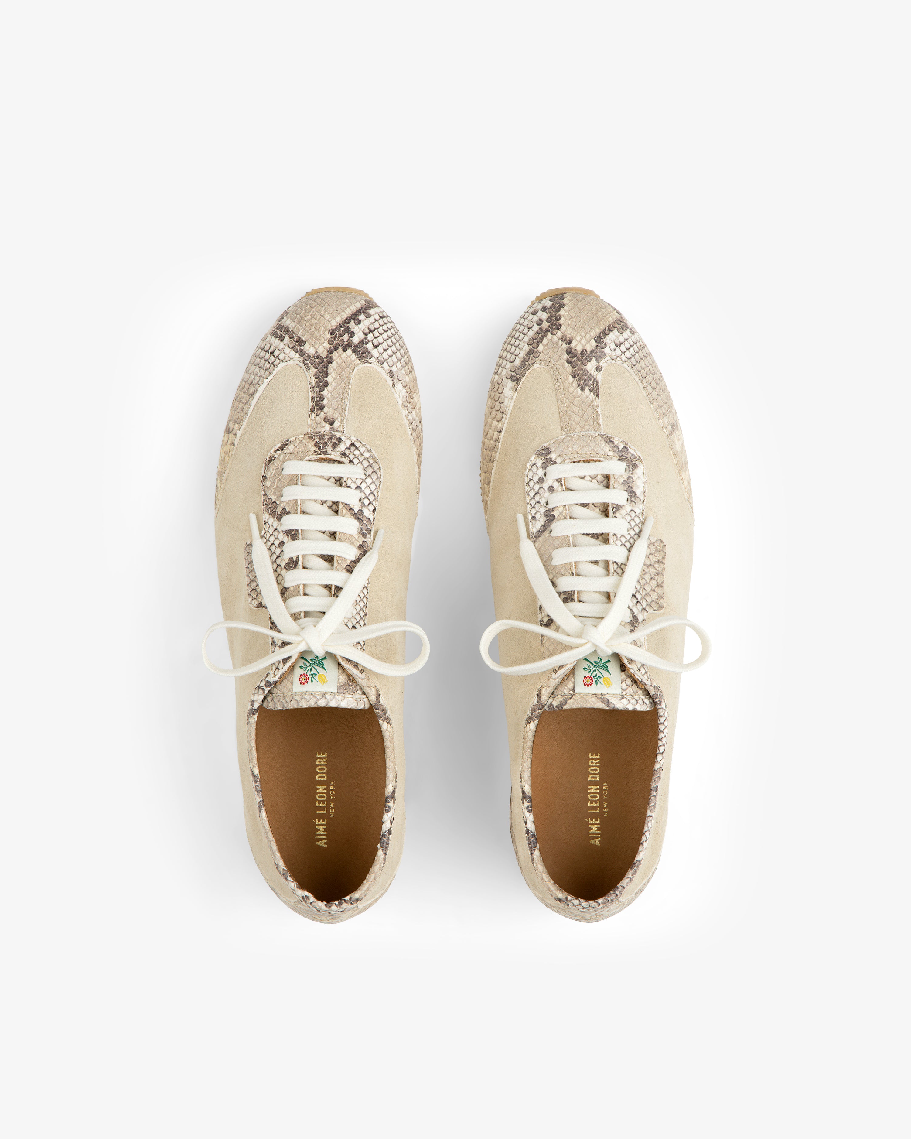 Snake Print Low Profile Suede Trainer with beige suede panels, a snake print pattern, and white laces.