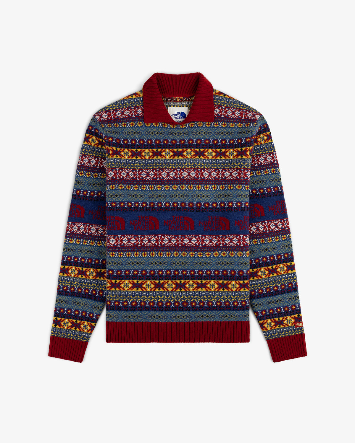 ALD / The North Face Fair Isle Knit Polo: Long-sleeve knit with red trim and colorful geometric and animal patterns.