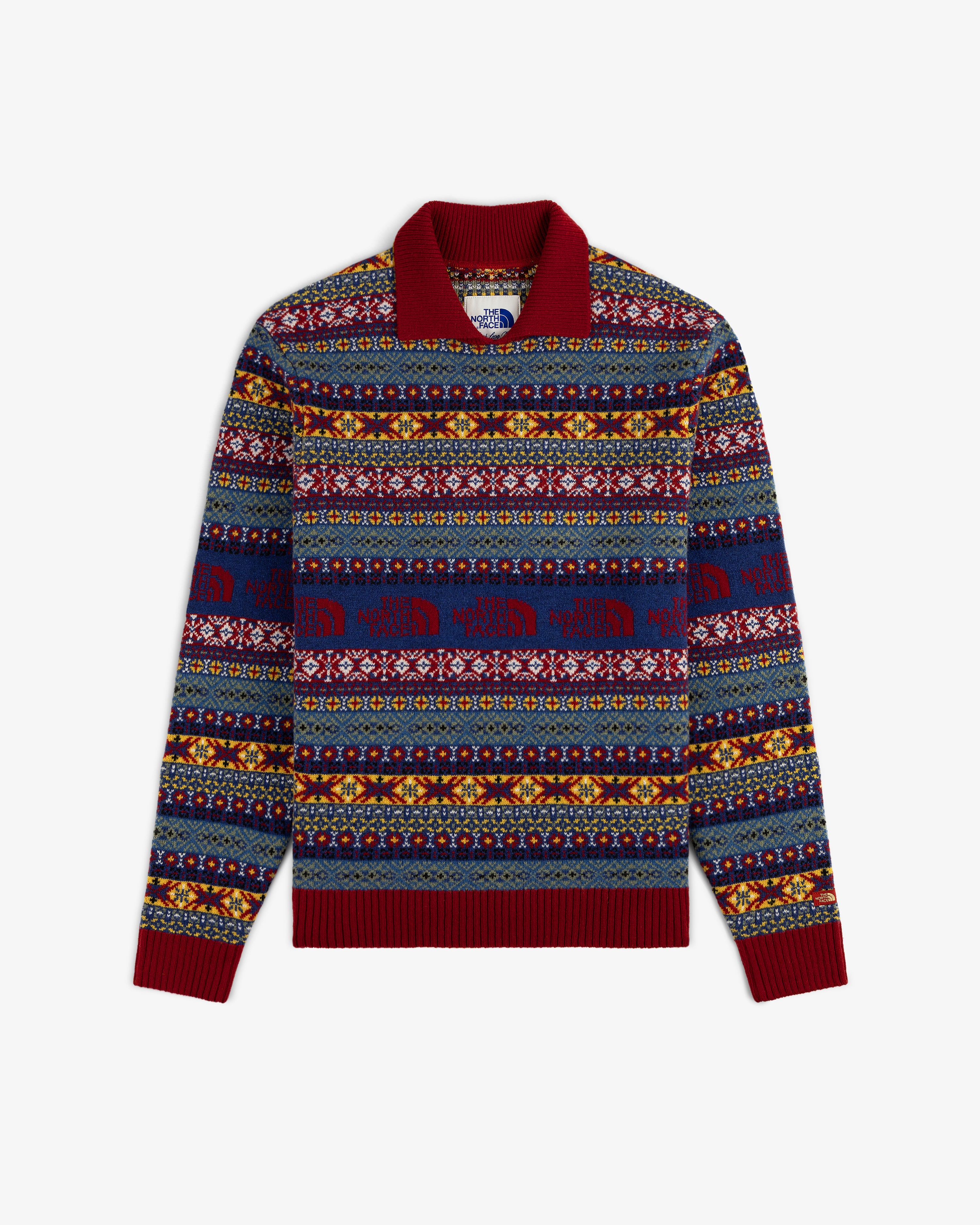 ALD / The North Face Fair Isle Knit Polo: Long-sleeve knit with red trim and colorful geometric and animal patterns.